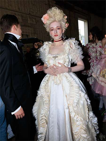 Julia Garner as Marie Antoinette